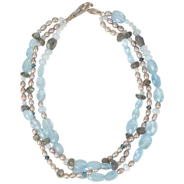  14kt white gold 3-strand necklace.  Gems: pearl, aquamarine, topaz, and labradorite.  Approximate length 17."  