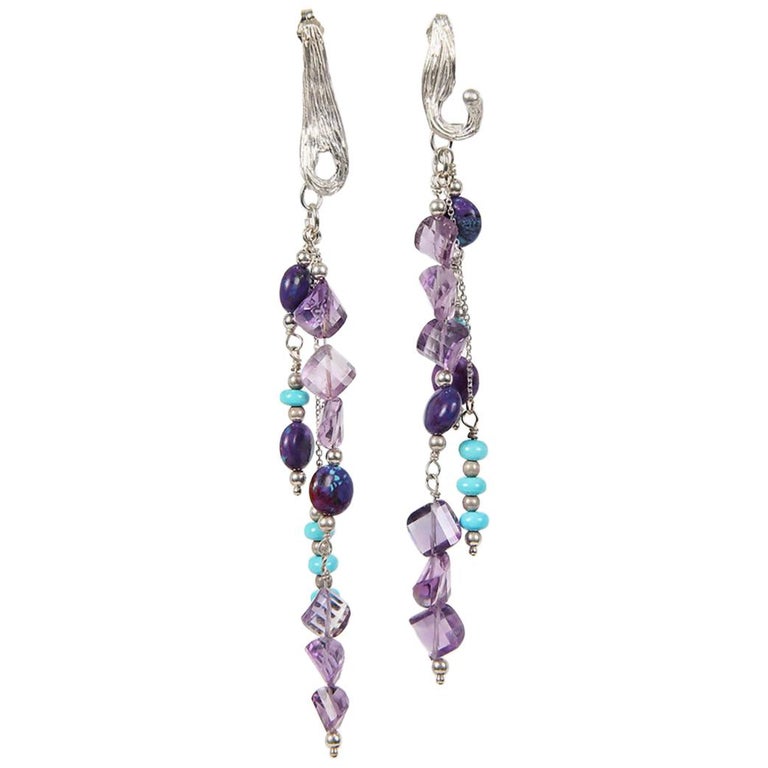 Turquoise, amethyst, and silver chandelier earrings.  Sterling silver White Orchid Studio’s vanilla bean earrings.  Approximately 4.5” long.