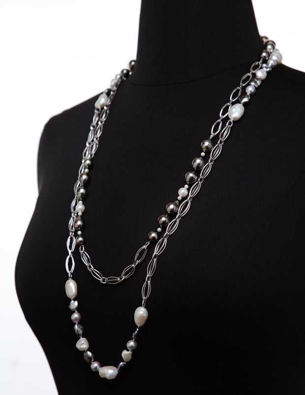 14kt heavy, Italian white gold chain.  Gems: akoya and keshi pearl.  White Orchid Studio logo clasp.  Approximate length 34." Two "Black Ties" layered.