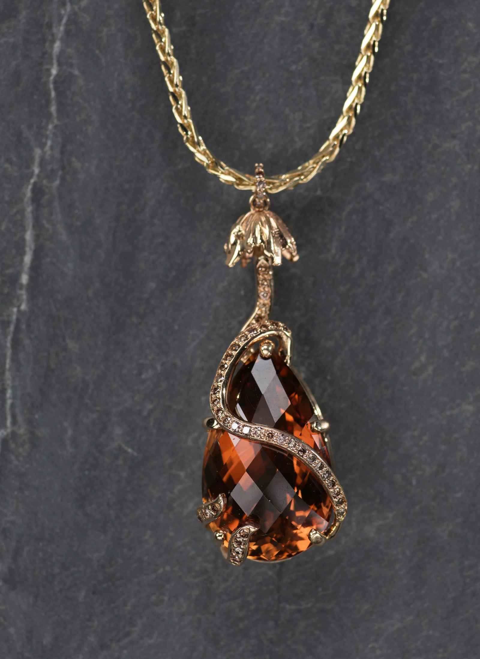 Soothing Sunset: A Precious Topaz, Diamond, and Gold Pendant