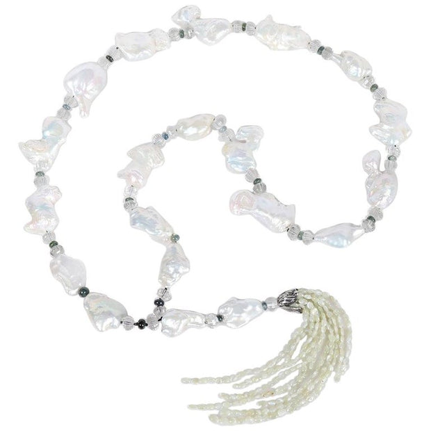 Sterling silver.  Gems: pearl, prasiolite, sapphire, and cat's eye chrysoberyl.  White Orchid Studio’s floral bead cap.  Approximate length 45."  