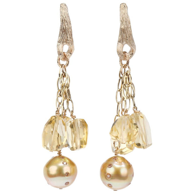 South sea pearls, Champagne diamonds (approximately .64 cts. t.w.), and citrine chandelier earrings.  14kt yellow gold chains and White Orchid Studio’s vanilla bean earrings. Approximately 2.5” long.