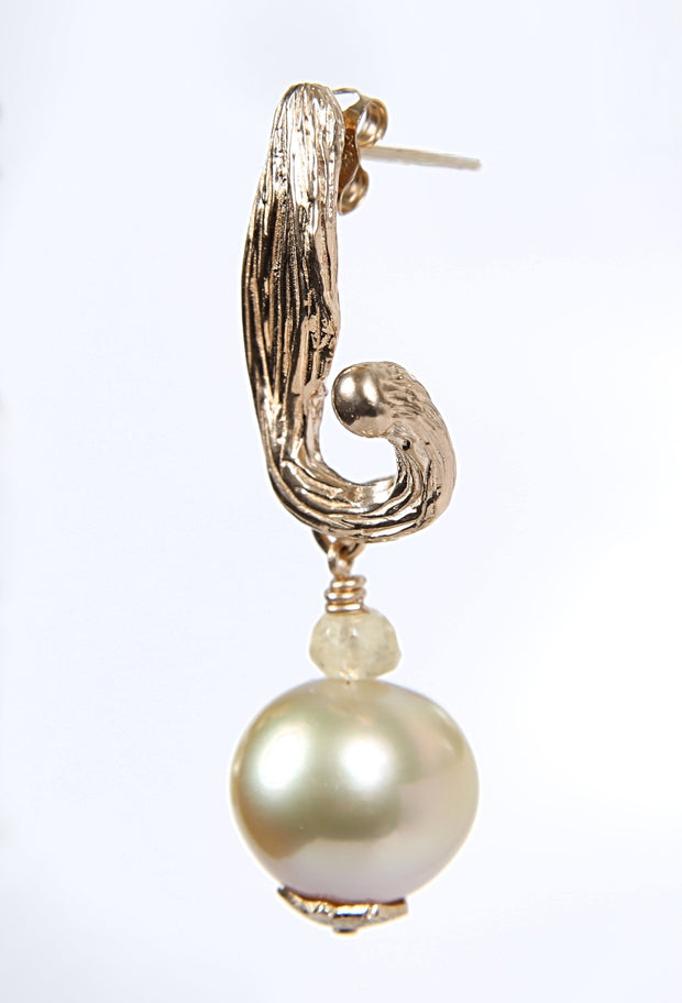 South Sea pearl earrings.  Golden pearls.  Songea Sapphires.  14kt yellow gold spacers and WOS vanilla bean pod earrings.  