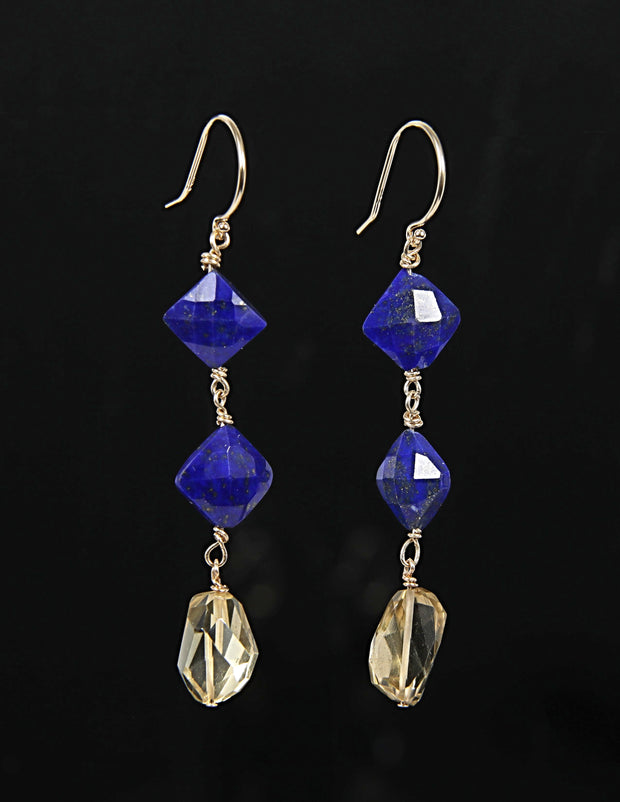 Drop earrings.  Gem earrings of citrine and lapis lazuli.  The shepherd hooks are 14kt yellow gold.