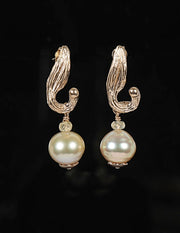South Sea pearl earrings.  Golden pearls.  Songea Sapphires.  14kt yellow gold spacers and WOS vanilla bean pod earrings.  
