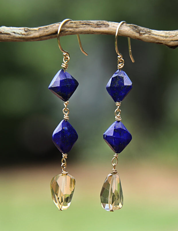 Drop earrings.  Gem earrings of citrine and lapis lazuli.  The shepherd hooks are 14kt yellow gold.