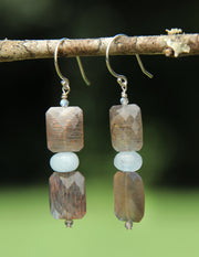 Drop earrings. Soft blue gems: hypersthene, aquamarine, and labradorite.  Sterling silver shepherd hooks.