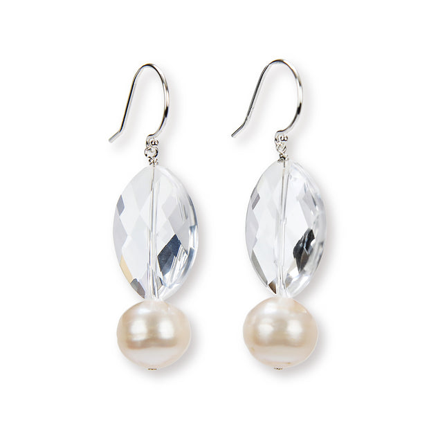 A drop ear wire of beautiful, white freshwater pearls, paired with a faceted, pear shape crystal quartz.  A sterling ear wire suspends the gems for an approximate 2" length. 