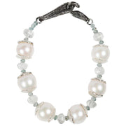 Gem bracelet: freshwater pearls (11mm), prasiolite, and apatite.  White Orchid Studio’s vanilla bean clasp and custom spacers in sterling silver.  8.5.” 