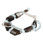 Smoky quartz, aquamarine, hypersthene, and silver bracelet.  Sterling silver.  White Orchid Studio vanilla bean clasp.  8”