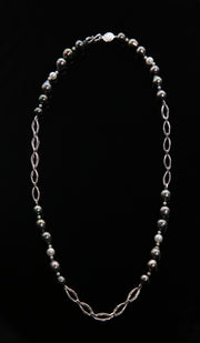 14kt heavy, white gold chain.  Gems: Tahitian and akoya pearl.  White Orchid Studio logo clasp.  Approximate length 26."  