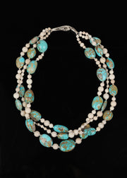 14kt. white gold.  Gems:  Peruvian opals, river stone jasper, freshwater pearls, and whiskey quartz.  Approximate length is 18.”