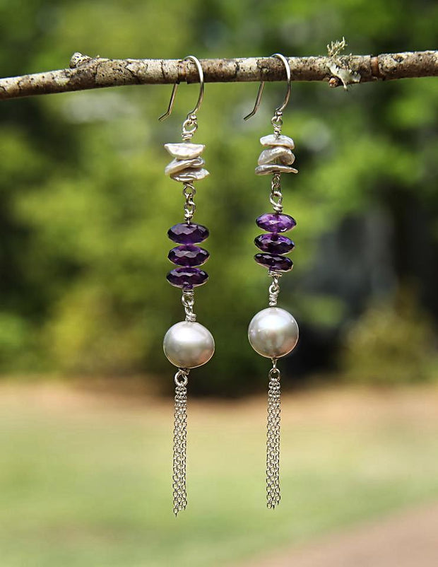 Drop earrings. Silver freshwater pearls combine with amethyst and sterling silver chain on sterling shepherd hooks .    
