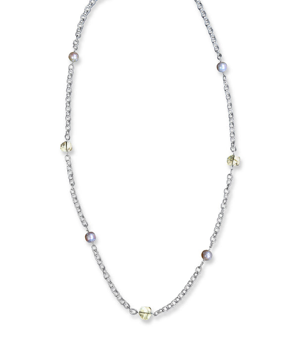 Sterling silver textured chain.  Gems: freshwater pearl and crystal quartz.  Approximate length 32."  