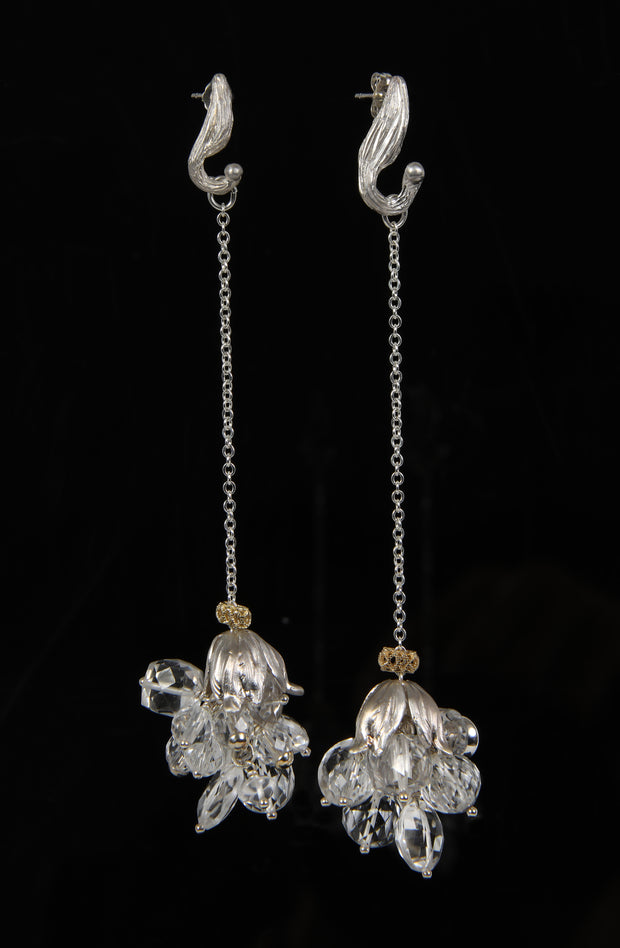 Sterling silver and 14kt yellow gold earrings.  Gem: clear quartz.   White Orchid Studio vanilla bean earrings and floral bead caps. 4”