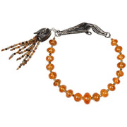 A mandarin garnet and orange sapphire bracelet. Sterling silver, vanilla bean clasp and bead cap antiqued with black max to enhance the texture. 7.5”