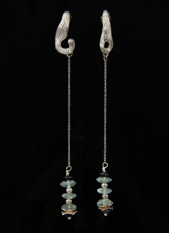 Sterling silver and gem earrings. Gems: moss aqua and green sapphires. White Orchid Studio’s wave spacers and our vanilla bean earrings.  Approximate length 3.75.”