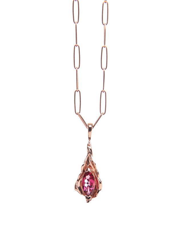 14kt rose gold charm embraces a faceted, marquis rose tourmaline (1.01 cts.).